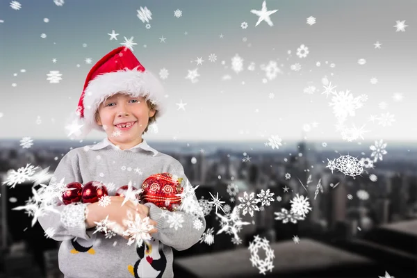Imagem composta de menino festivo sorrindo — Fotografia de Stock