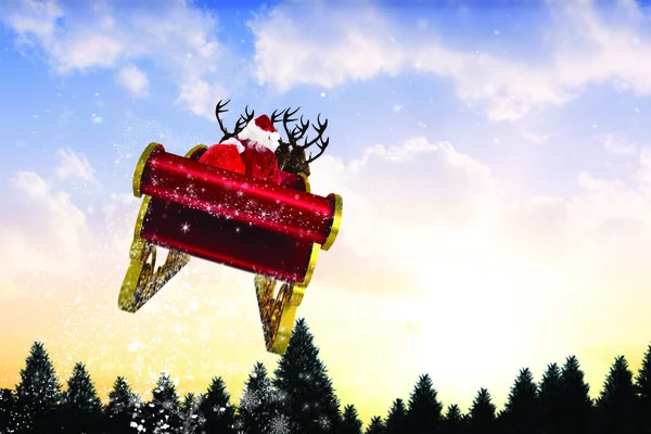 Composite image of santa flying his sleigh — Stock Photo, Image