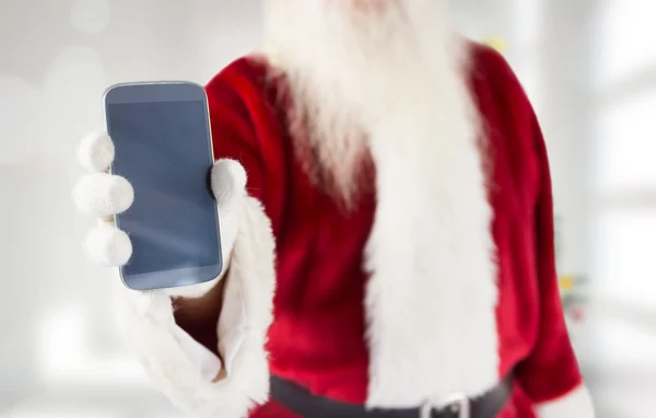 Kompositbild von Weihnachtsmann mit Smartphone — Stockfoto