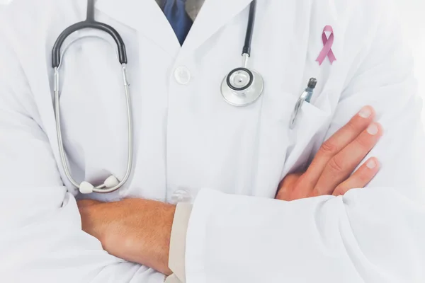 Composite image of doctor wearing lab coat — Stock Photo, Image