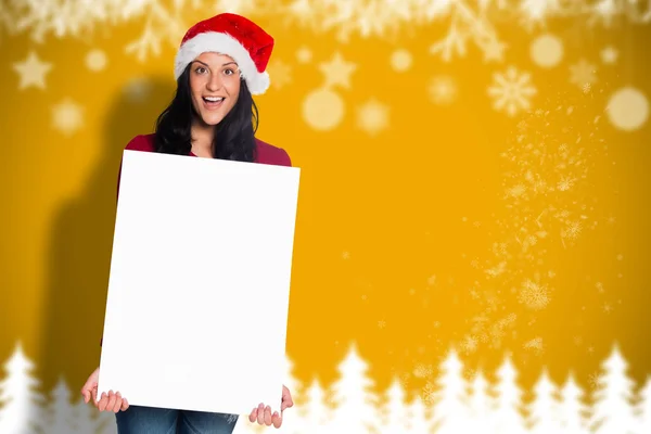 Composite image of woman holding a white sign — Stock Photo, Image