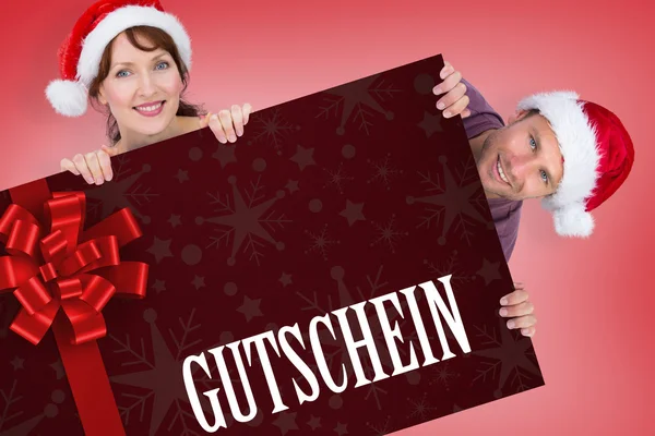 Kompositbild eines Paares, das beide Weihnachtsmützen trägt — Stockfoto