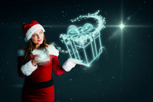 Chica en traje de santa celebración de la mano — Foto de Stock