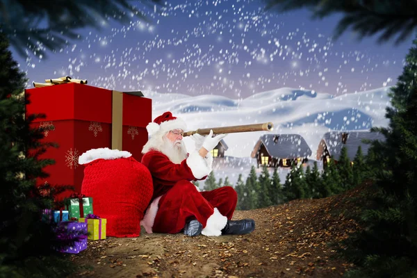 Immagine composita di Babbo Natale che guarda attraverso un telescopio — Foto Stock