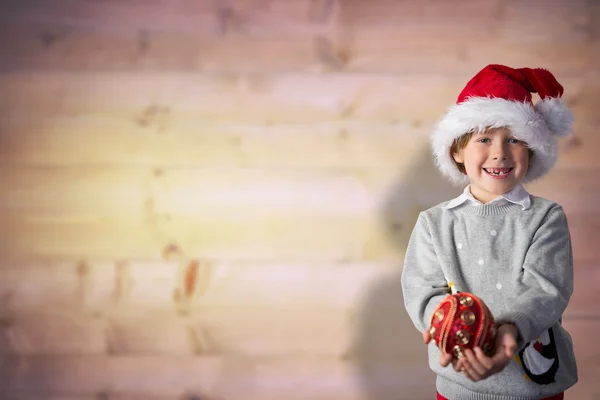 Imagen compuesta de niño festivo sonriendo —  Fotos de Stock