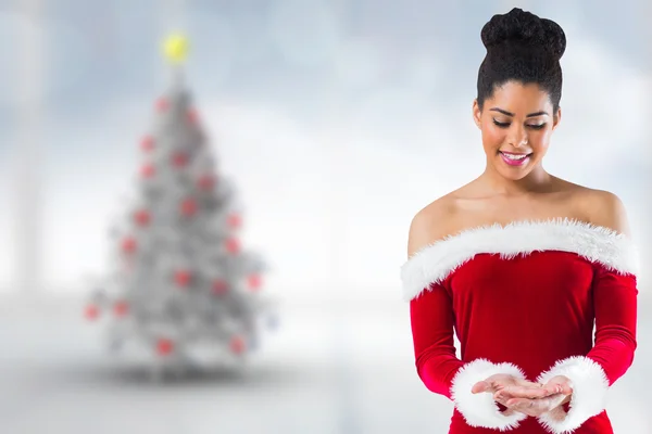 Imagem composta de menina bonita santa apresentando com as mãos — Fotografia de Stock