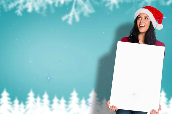 Composite image of woman holding a white sign — Stock Photo, Image