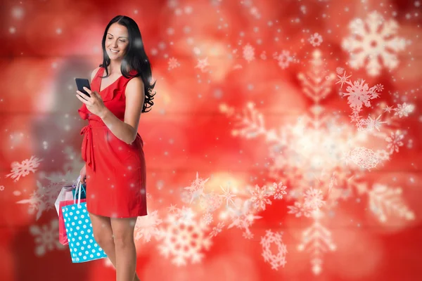 買い物袋に立っている女性の合成画像 — ストック写真