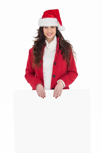 Cheerful brunette showing white poster — Stock Photo, Image