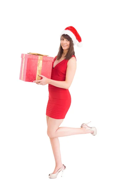 Świąteczny brunetka trzyma prezent — Zdjęcie stockowe