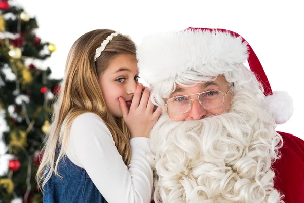 Petite fille teling père Noël claus un secret — Photo