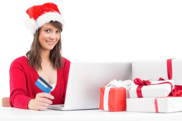 Morena festiva de compras en línea con ordenador portátil —  Fotos de Stock