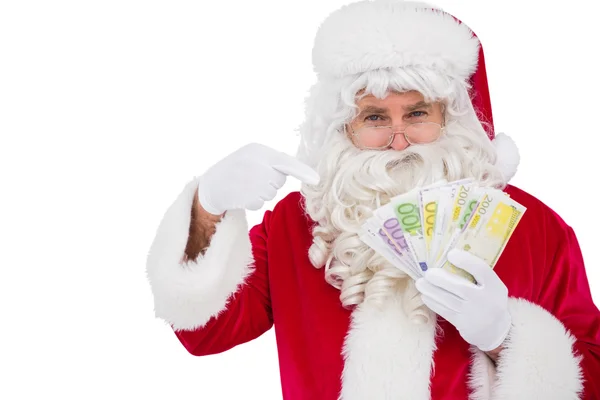 Santa claus pointing his cash — Stock Photo, Image