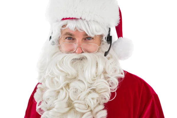 Babbo Natale sorridente con auricolare — Foto Stock