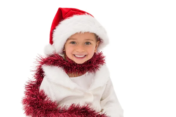 Schattig klein meisje dragen kerstmuts en klatergoud — Stockfoto