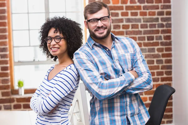 Business people with arms crossed — Stock Photo, Image