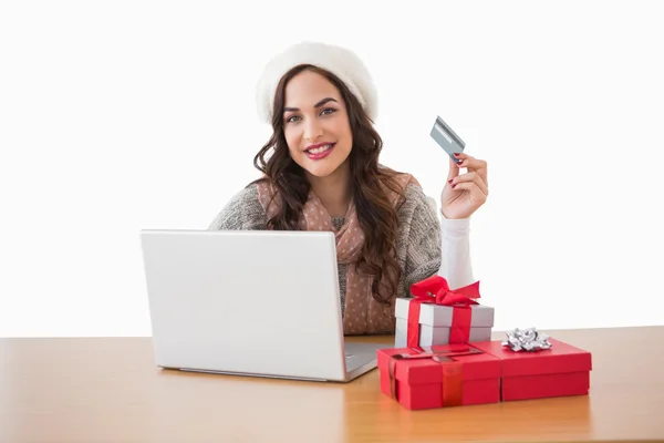 Pretty brunette shopping online with laptop — Stock Photo, Image