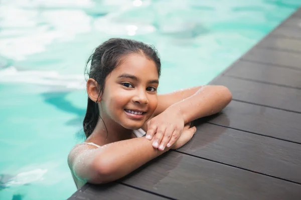 Little girl smiling in the pool — Stock Photo, Image