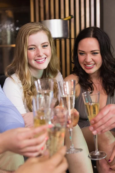 Stylish friends having a drink together — Stock Photo, Image