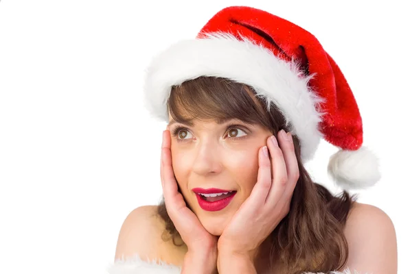 Hübsches Weihnachtsmädchen mit den Händen im Gesicht — Stockfoto