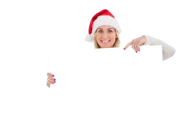 Festive blonde showing white poster — Stock Photo, Image