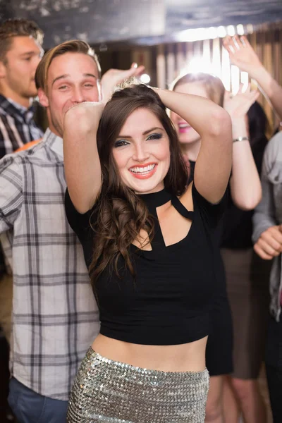 Stylish brunette smiling at camera — Stock Photo, Image