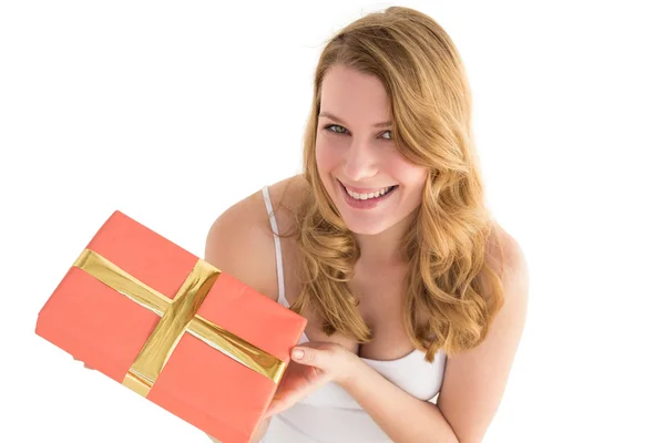 Cute blonde holding a gift — Stock Photo, Image