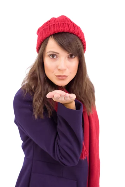 Festive brunette blowing a kiss — Stock Photo, Image