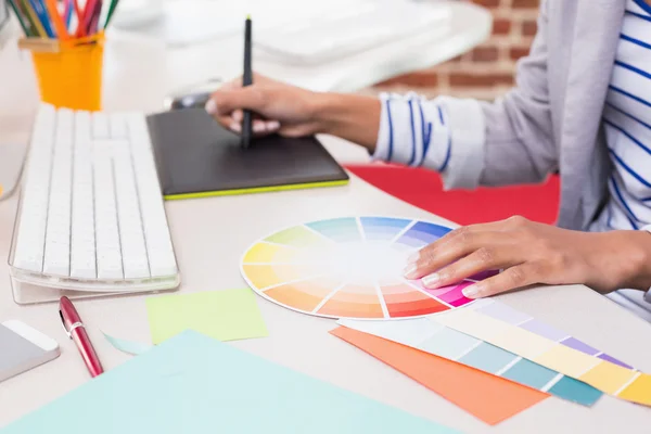 Hand using digitizer in office — Stock Photo, Image