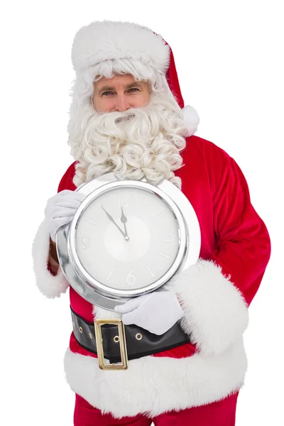 Happy santa drží hodiny — Stock fotografie