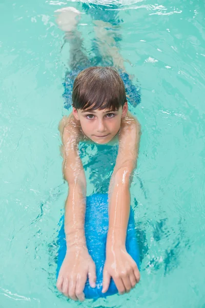 Cute little boy learning to swim — Stock Photo, Image