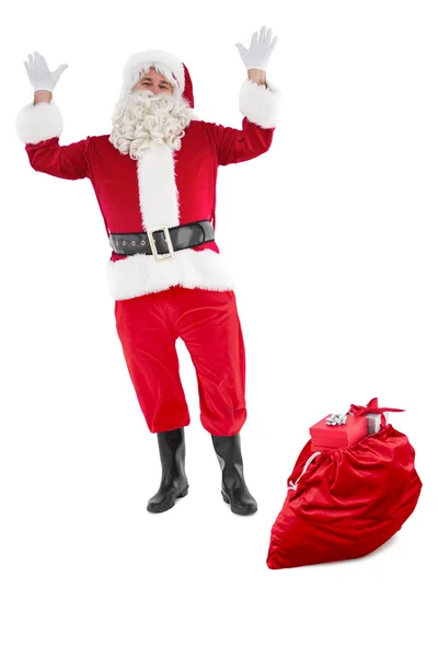 Glücklicher Weihnachtsmann mit Sack voller Geschenke — Stockfoto