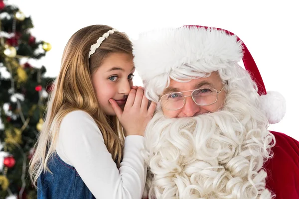 Petite fille teling père Noël claus un secret — Photo