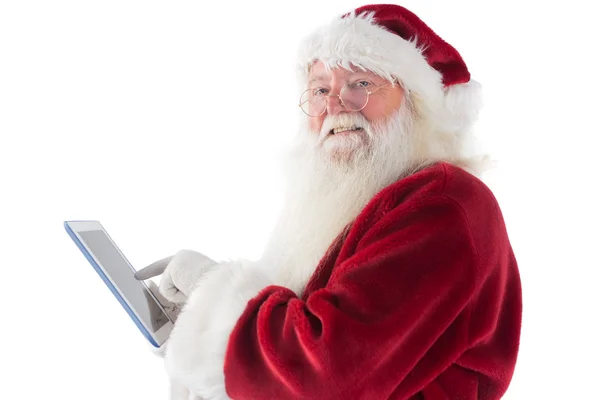 Santa nutzt Tablet-PC — Stockfoto