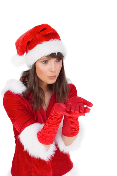 Pretty girl holding hands out in santa outfit — Stock Photo, Image