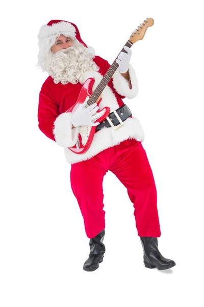 Sorrindo santa tocando guitarra elétrica — Fotografia de Stock