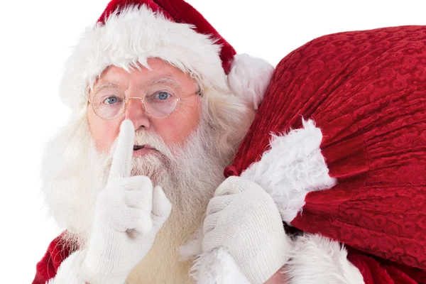Santa ber ro med väska — Stockfoto