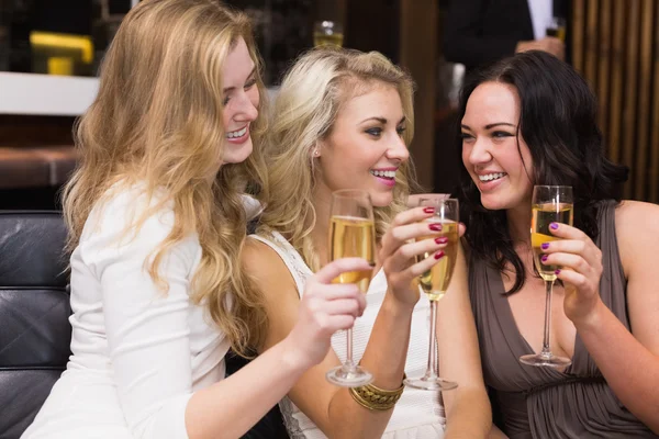 Happy friends drinking champagne together — Stock Photo, Image