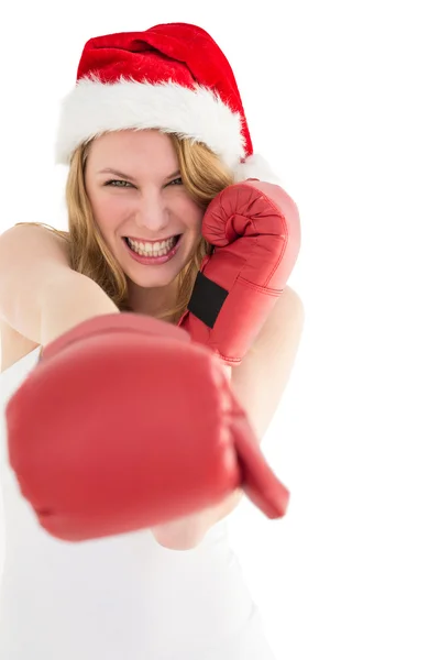 Festlig blondin stansning med boxhandskar — Stockfoto