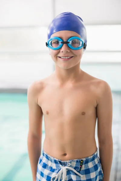 Cute little boy standing poolside Royalty Free Stock Photos