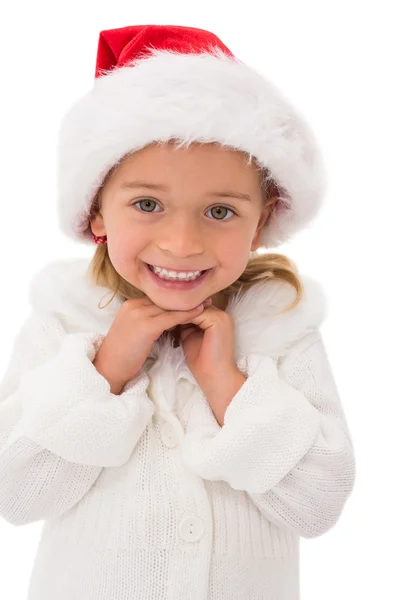 Cute little girl wearing santa hat Stock Photo
