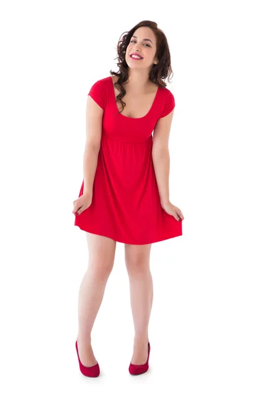 Stylish brunette in red dress — Stock Photo, Image