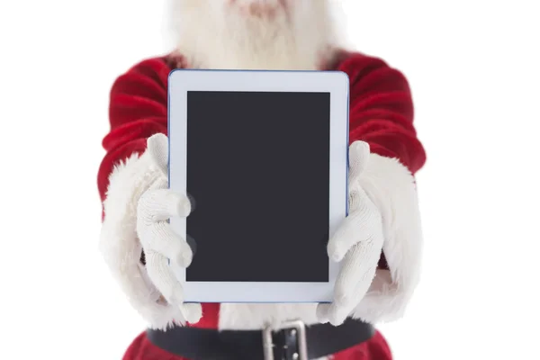 Santa presenting tablet PC — Stock Photo, Image