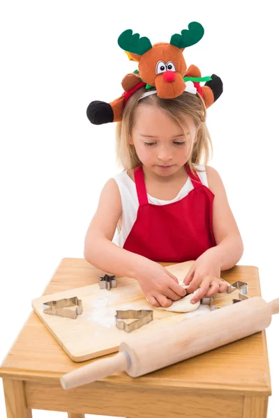 Bambina festiva che fa biscotti — Foto Stock