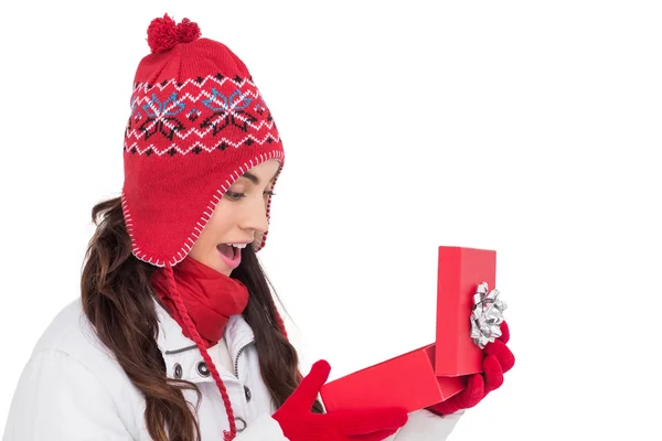 Happy brown hair opening christmas gift — Stock Photo, Image