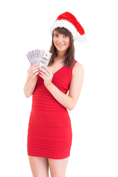 Morena festiva em vestido vermelho mostrando seu dinheiro — Fotografia de Stock