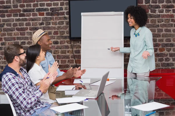 Business team clapping hands in meeting — Stock Photo, Image