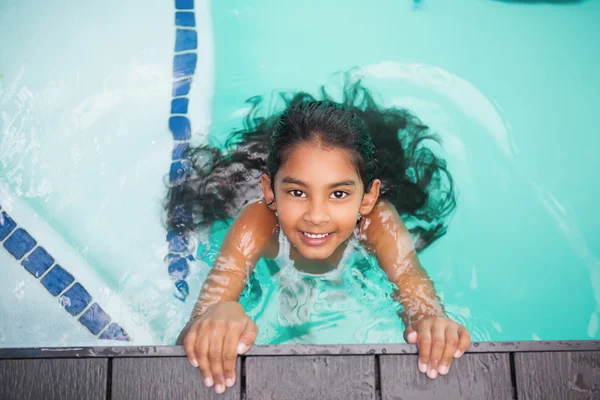 Little girl smiling in the pool — Stock Photo, Image