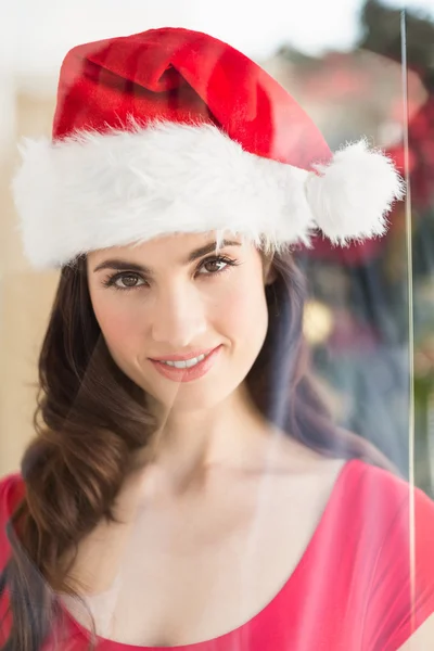 Portrait of a festive brunette at christmas — Stock Photo, Image