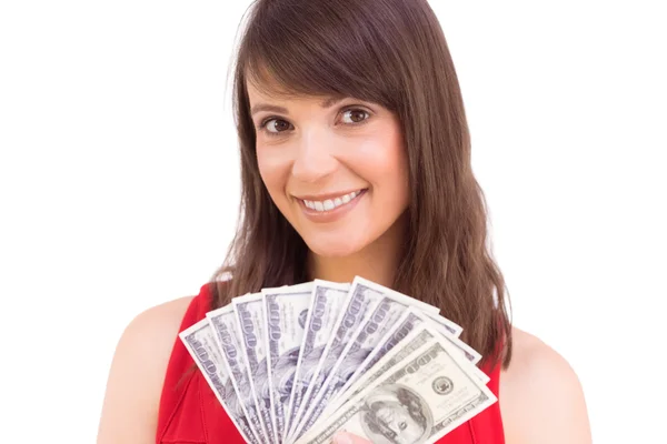 Brunette showing fan of dollars — Stock Photo, Image